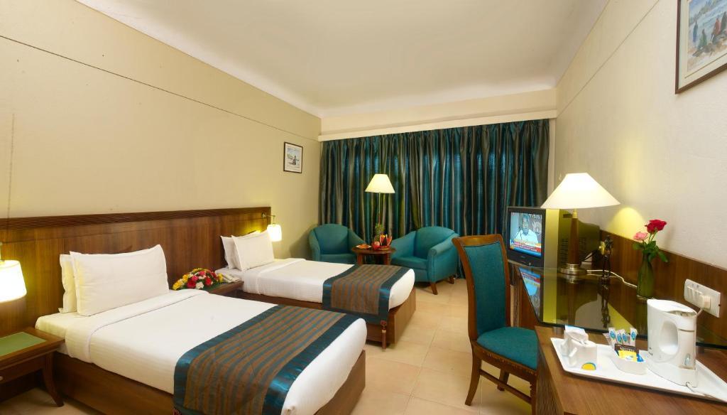 Uday Suites - The Airport Hotel Thiruvananthapuram Quarto foto